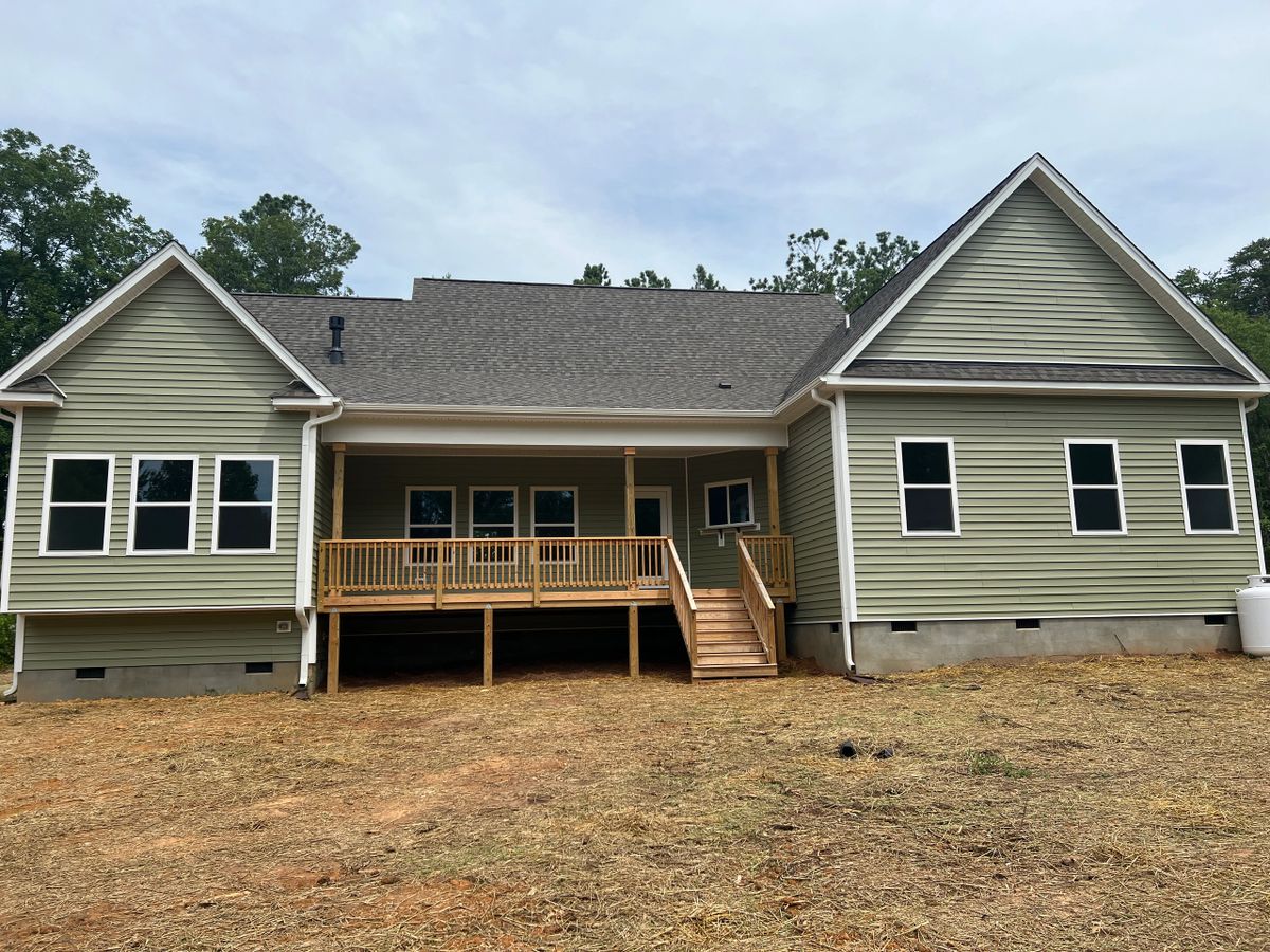 BKA Builders custom craftsman home with covered front porch and dormers in the Triad NC