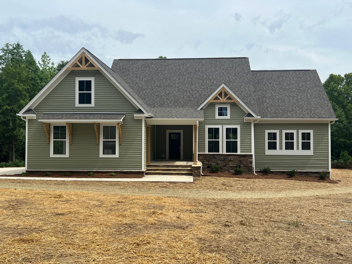 BKA Builders custom traditional two-story home with stone accents in Greensboro NC